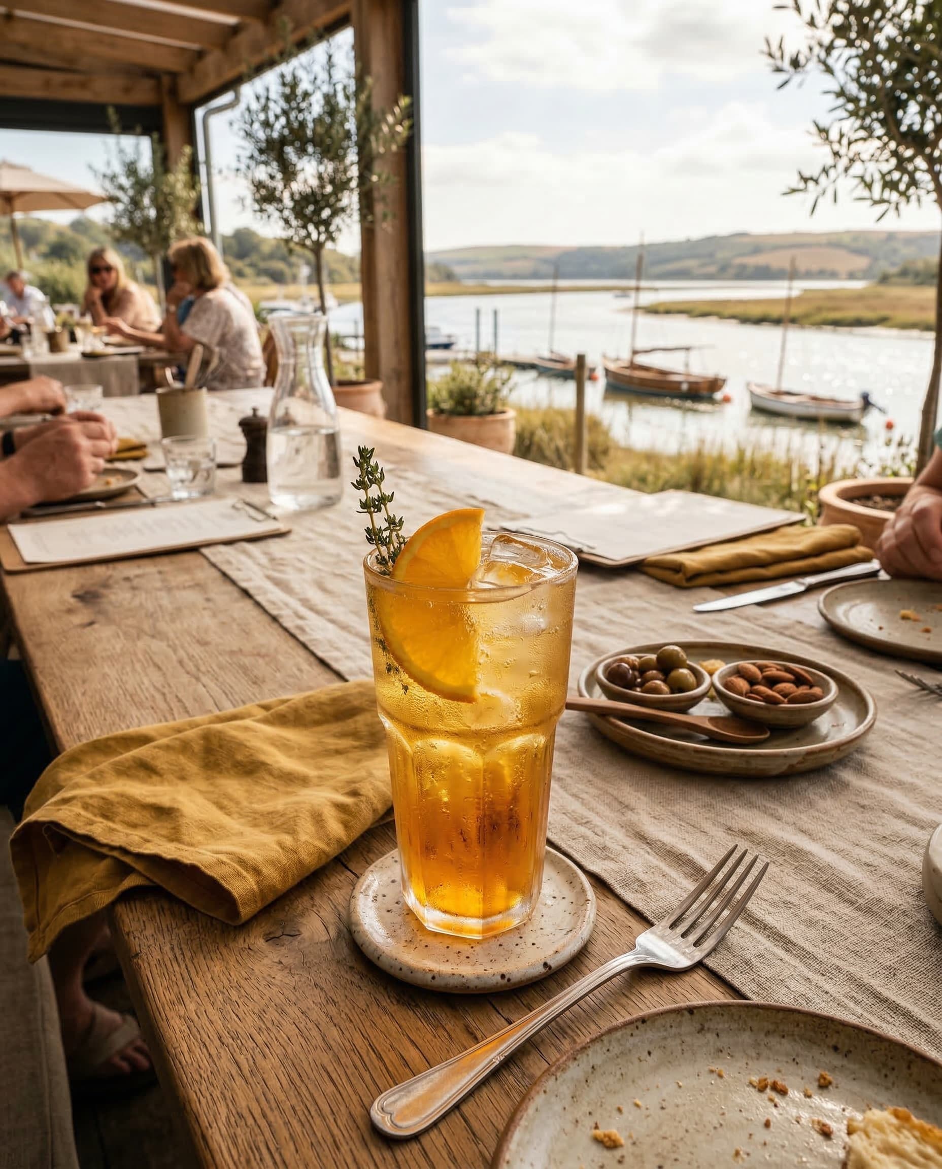 Golden drink on a long lunch table at Salt & Fynbos